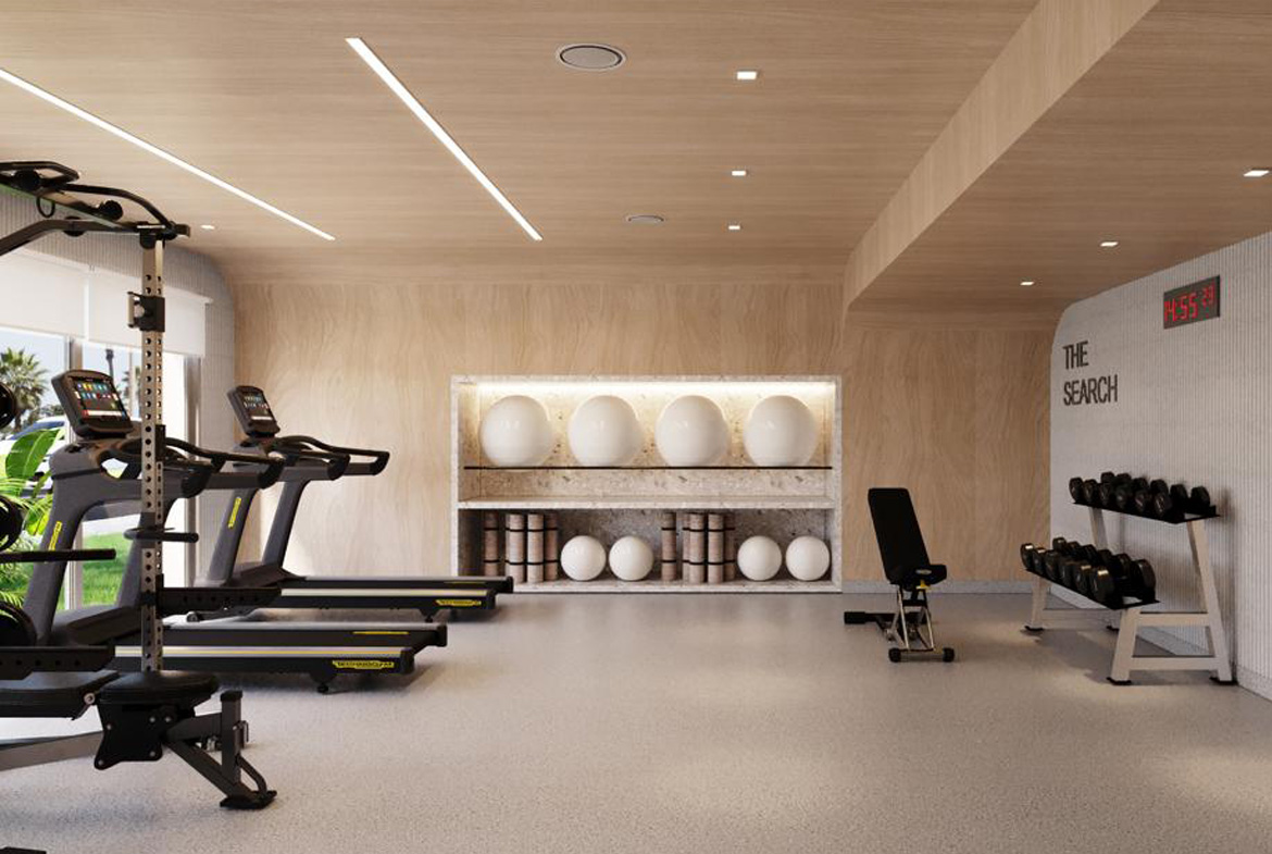 Gimnasio moderno en The Wave Miraflores con vista al mar